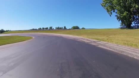car driving fast dangerous curvy road