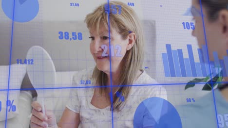 animation of multiple graph with changing numbers, caucasian woman styling hair using mirror