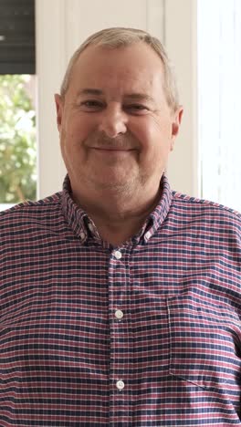 mature man looking at the camera while talking