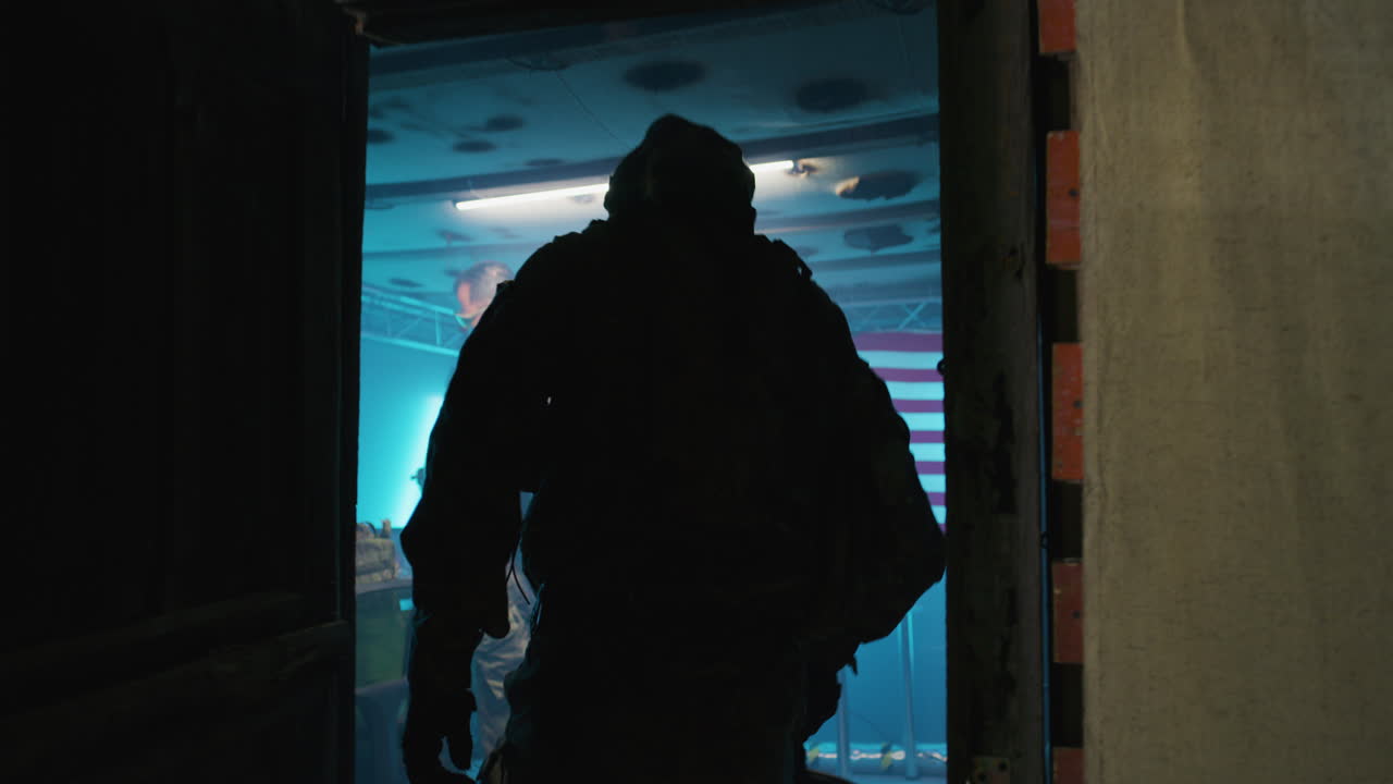 Military personnel in a war room discussing an operation