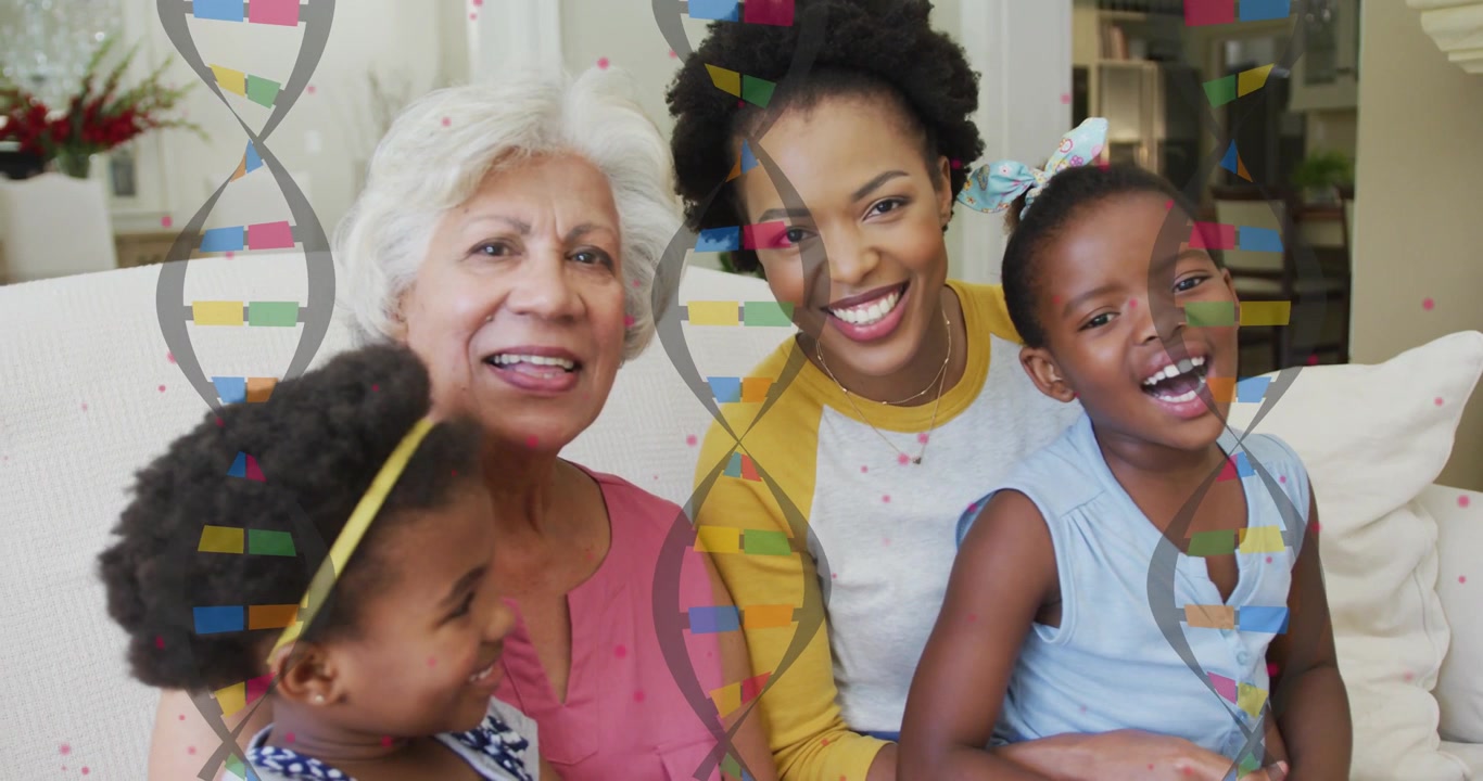 Mother leaning and draping arm, family laughing on sofa with DNA overlay, showing genetics link