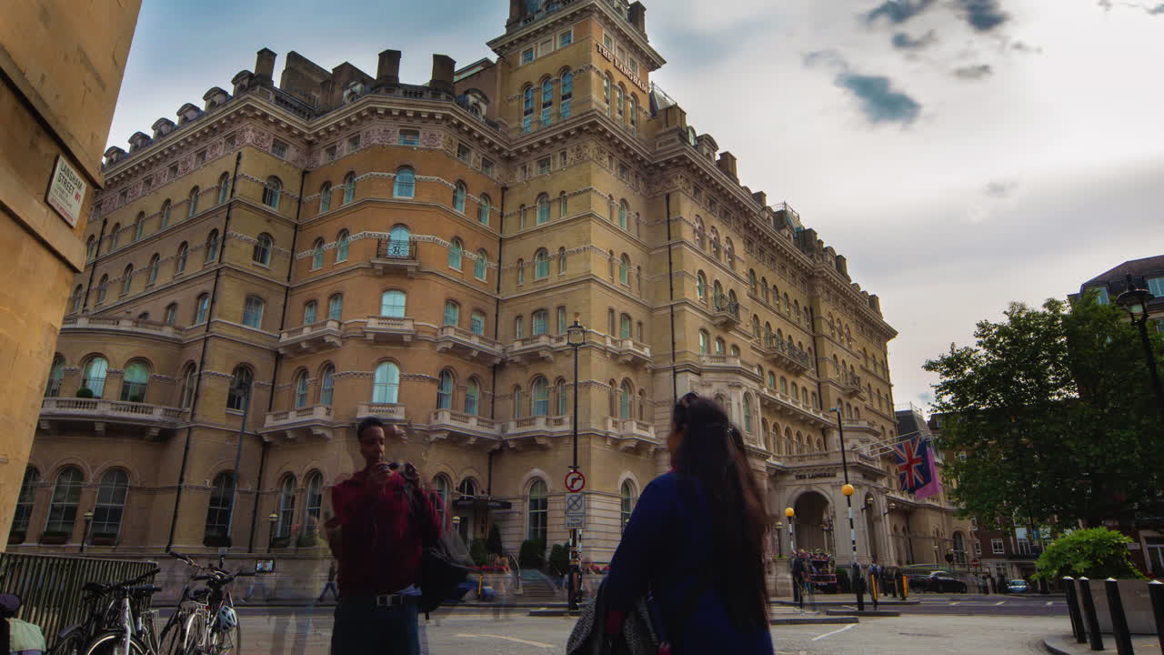 The Langham Hotel in London: Urban Street Scene with Pedestrians and Traffic