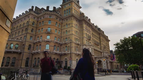 the langham hotel in london: urban street scene with pedestrians and traffic