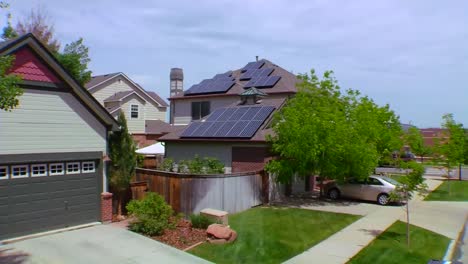 aerial of solar panels adorning the tops of houses in a residential neighborhood 1