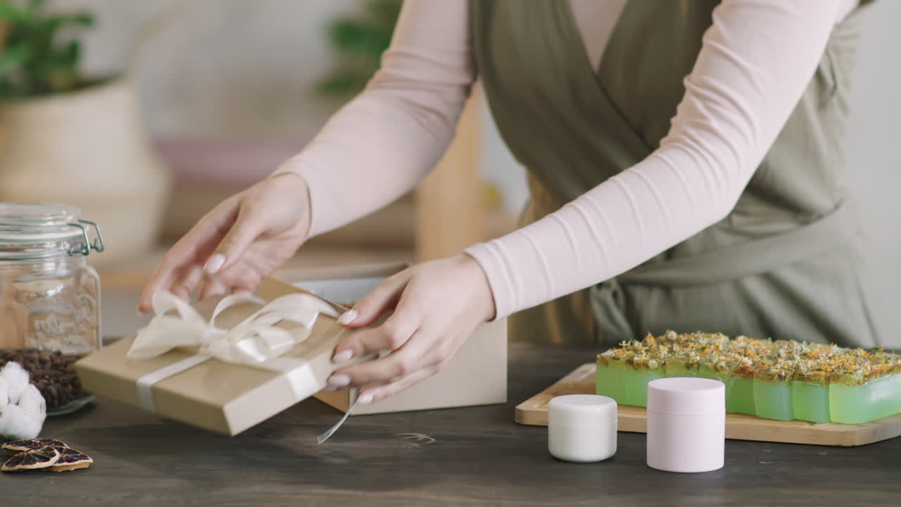 Woman Packing Natural Cosmetics In Gift Box