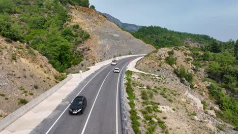 mountain road with cars