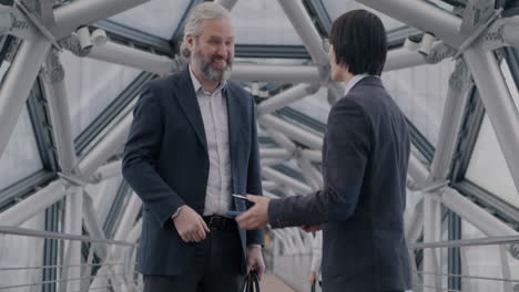business meeting on modern bridge
