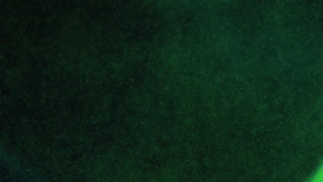 green moving sparkling speckles texture background