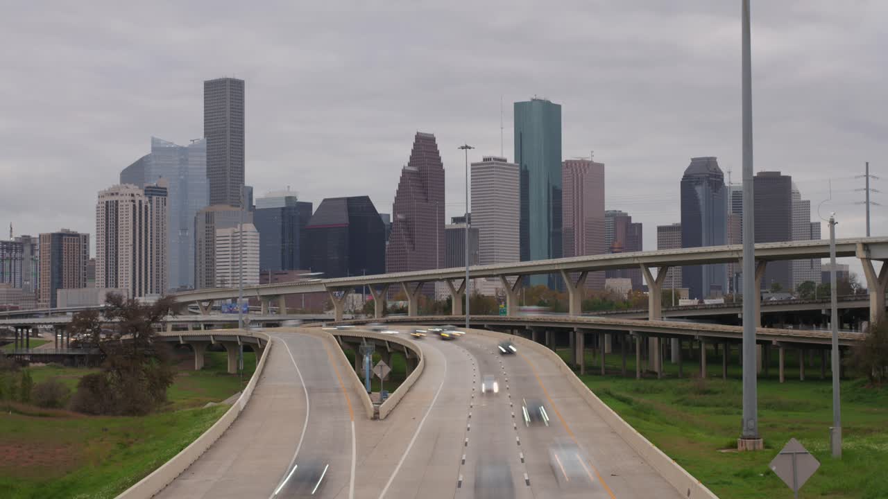 Timelapse of cars on I-45 North freeway with downtown in the background in Houston, Texas
