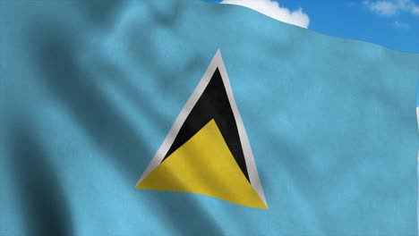 Saint Lucia flag waving in the wind, blue sky background. 4K