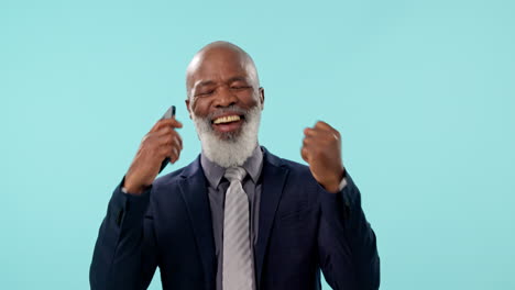black man in studio with phone