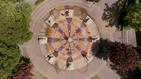 top-down view of chattanooga’s fountain plaza with outward spraying water jets, surrounded by park greenery in coolidge park
