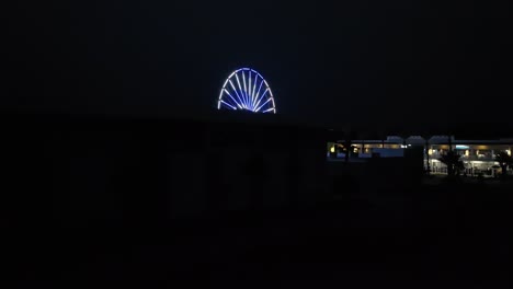 Vista-De-La-Rueda-De-La-Fortuna-Temprano-En-La-Mañana-En-El-Muelle-En-Orange-Beach,-Alabama