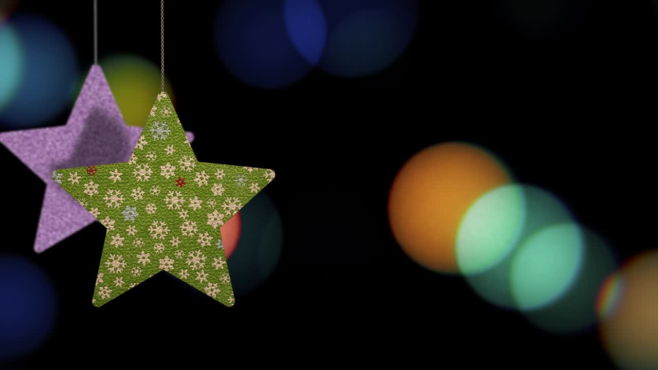 los adornos de las estrellas de navidad se mueven en el fondo de bokeh.