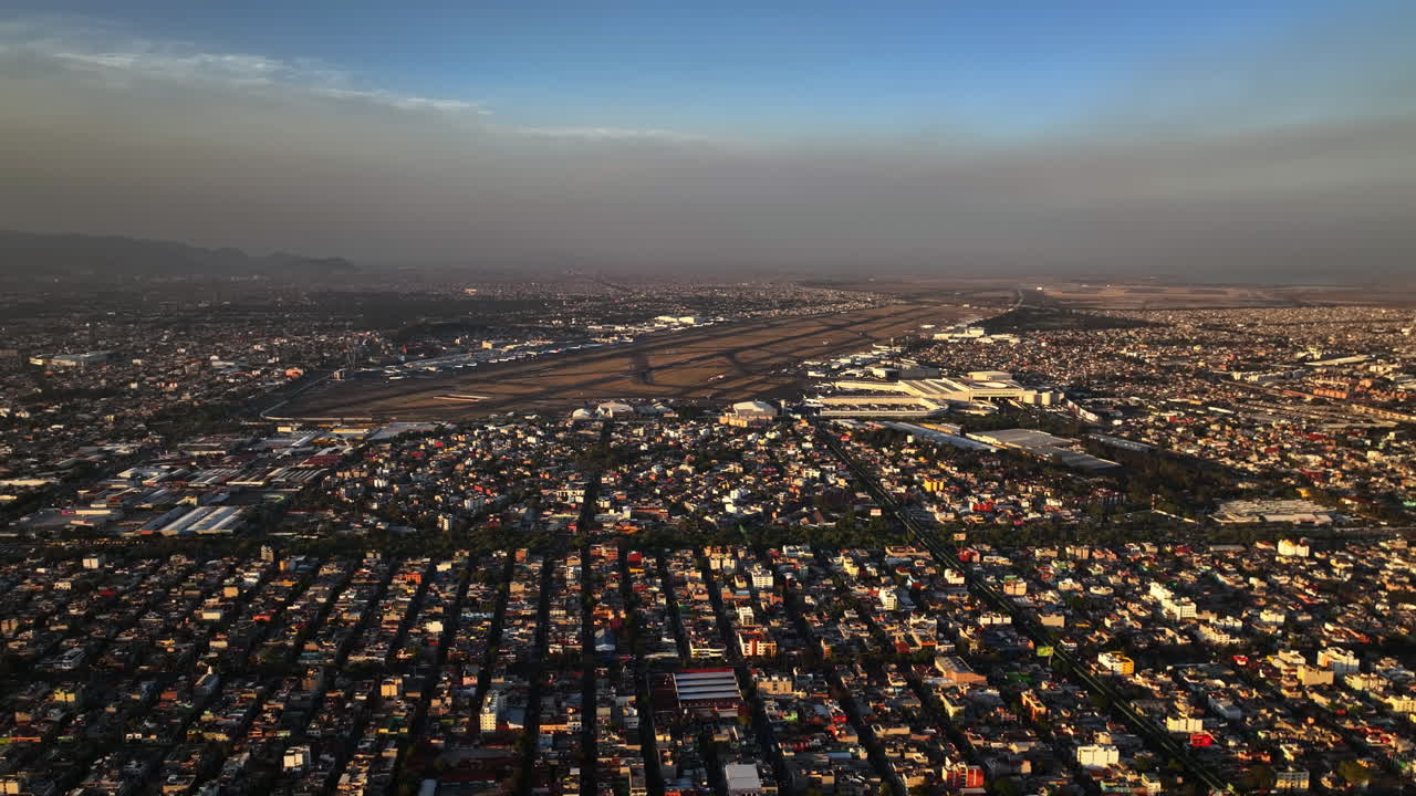 Aerial view of the Aeropuerto Internacional de la Ciudad de M&eacute;xico, sunset in Mexico city