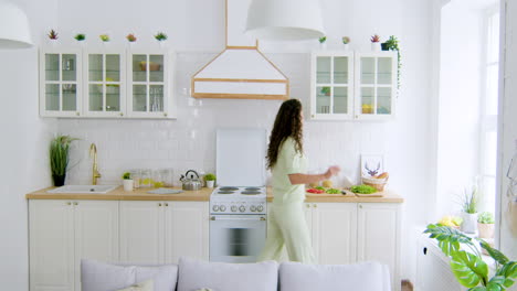 woman dancing in the kitchen