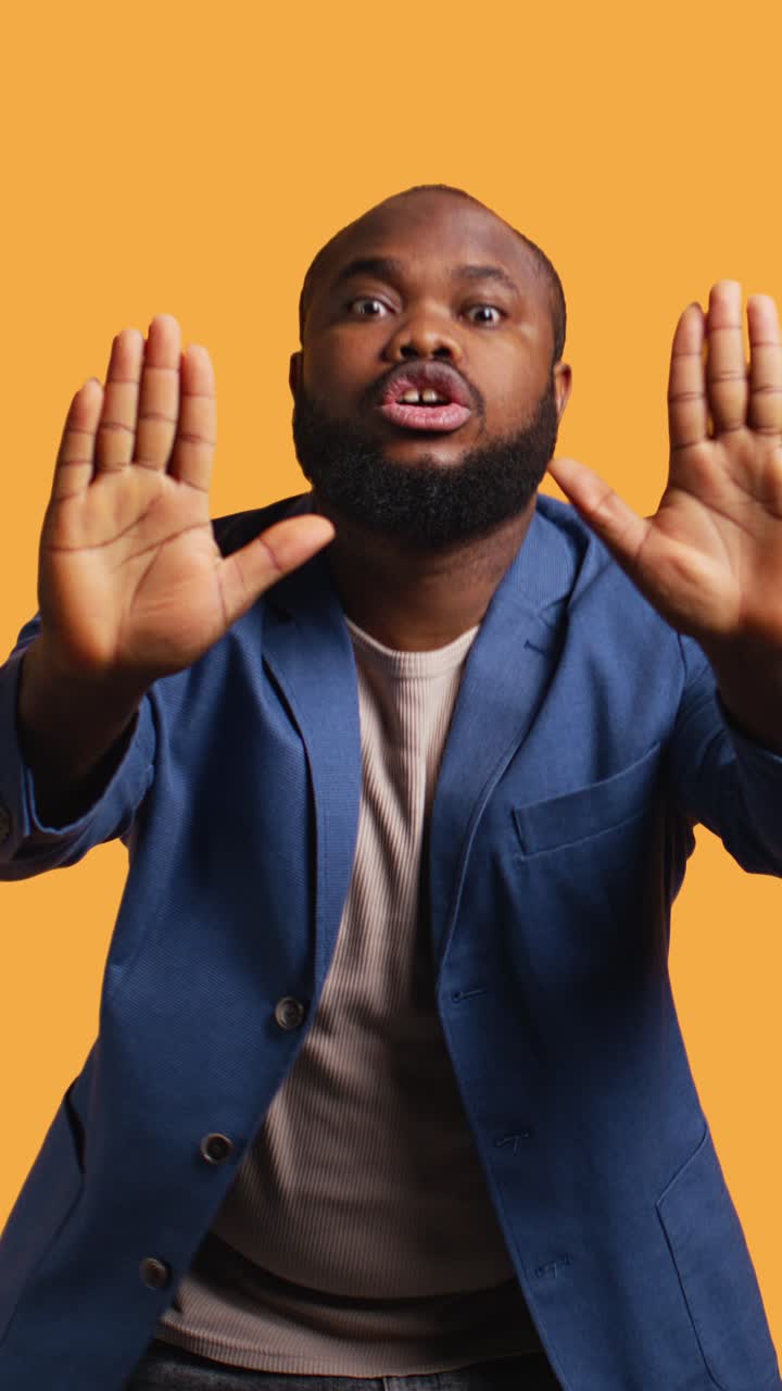 African American Man Making Stop Gesture and Expressing Shock