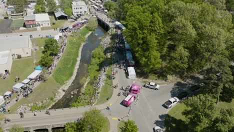 crowd of people during the event dogwood festival in siloam springs, ar, usa - drone shot