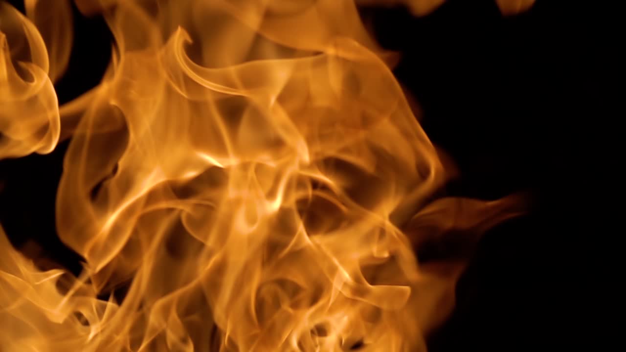 Flames of fire on black background in slow motion