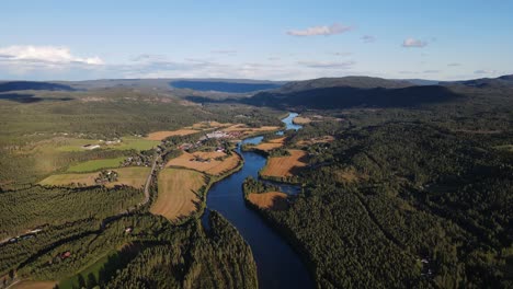 beautiful calm footage of mountains, valley and river in southern norway, drone footage