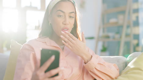 video call, phone and young woman in the living