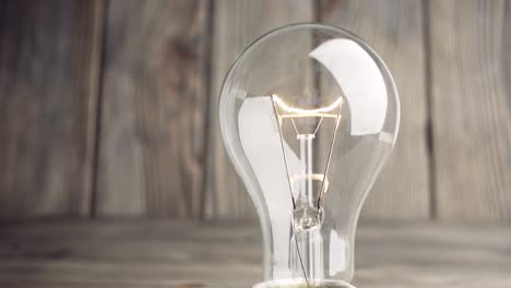 light bulb on wood background