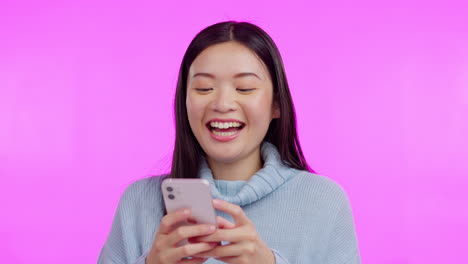Asian-woman,-phone-and-texting-with-laugh