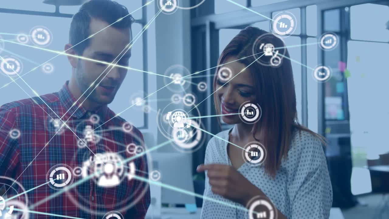 Animation of network of connections with icons over diverse business people using tablet