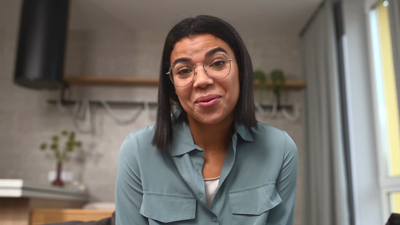 Multiracial brunette female having video call