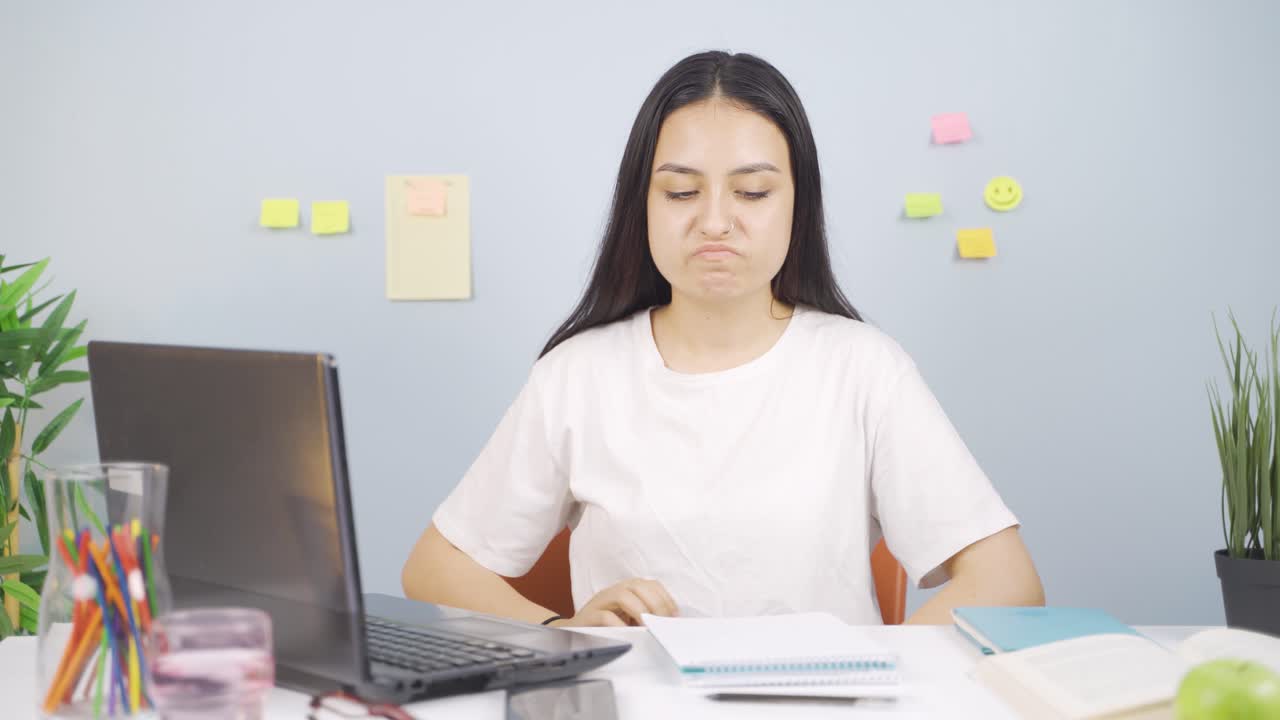 Poor Female student unhappy and sad.