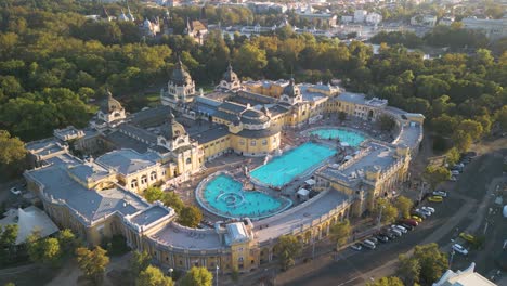 cinematic aerial view above szechenyi thermal baths