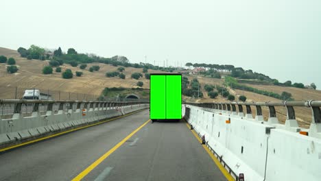 green screen on a track that runs on the road