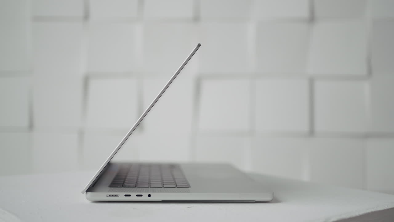 Silver Laptop on a White Surface