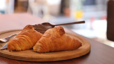 delicious croissants with chocolate spread