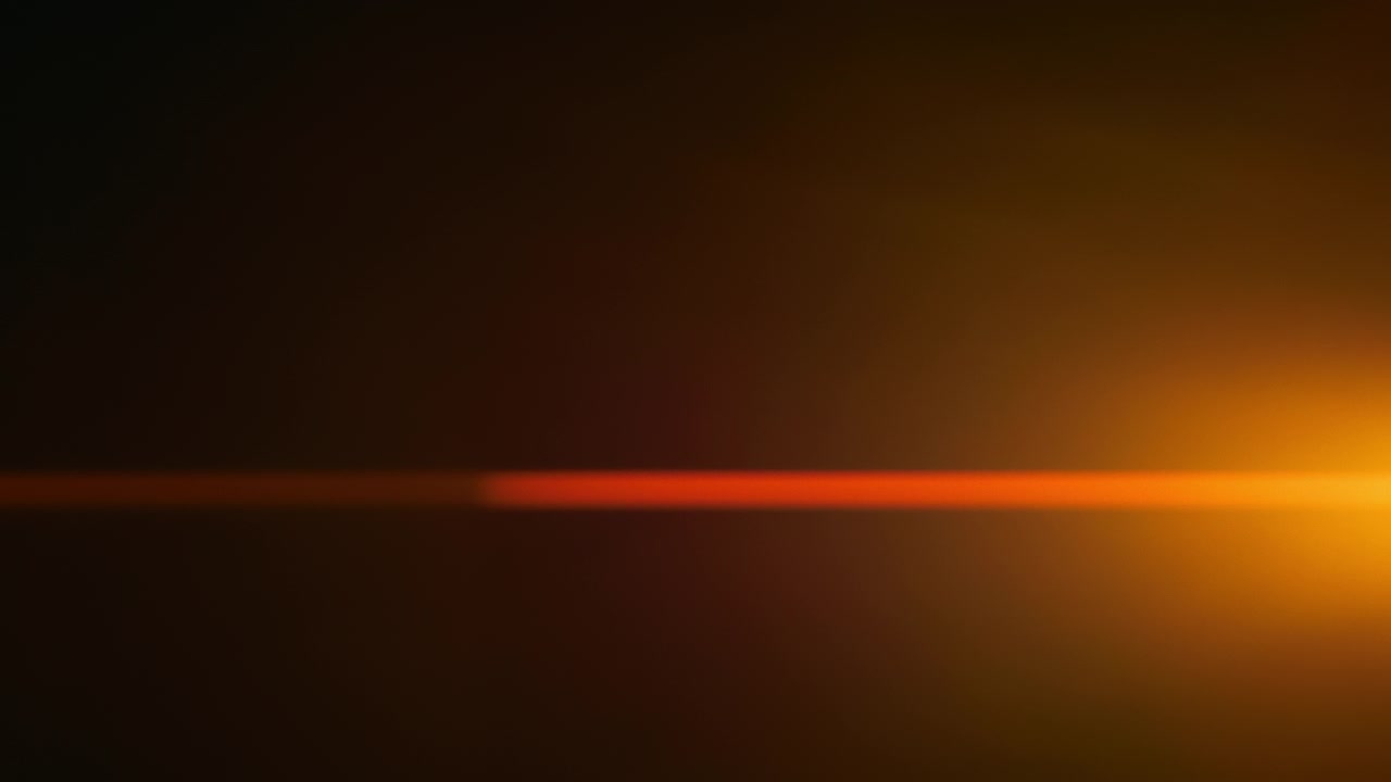 Red anamorphic lens flares with horizontal light leaks