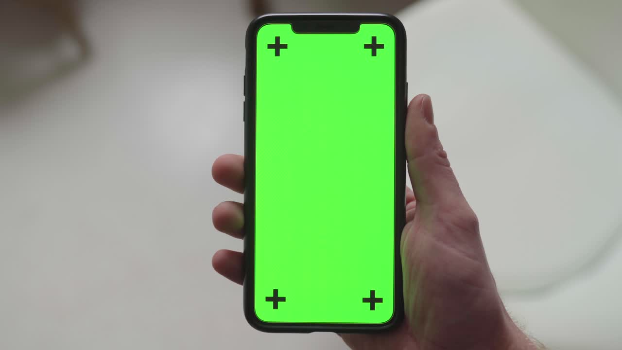puntos de seguimiento cruzado en la pantalla verde del teléfono móvil para ideas creativas