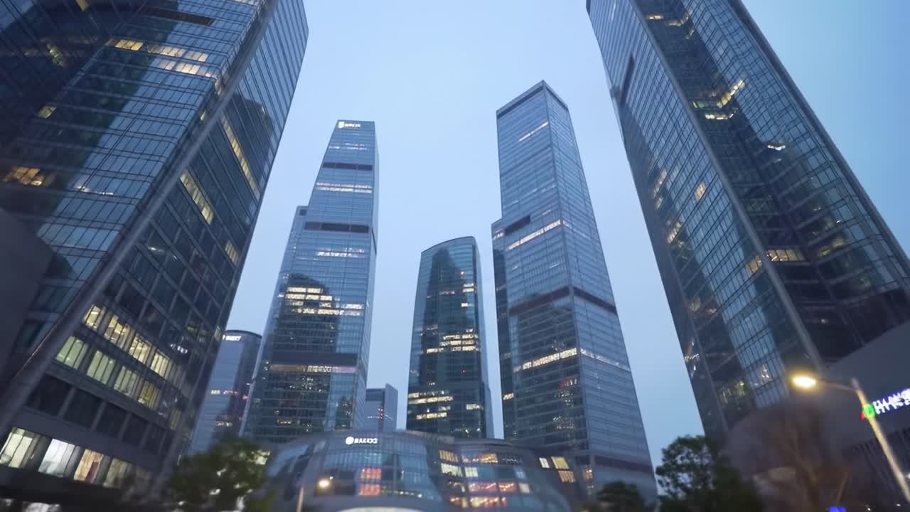 A Dynamic Urban Landscape at Dusk Featuring Modern Skyscrapers Towering Against a Twilight Sky, Illuminating the City with Architectural Brilliance and Innovation