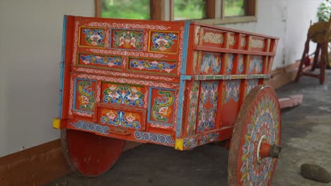 a vibrantly painted traditional costa rican oxcart