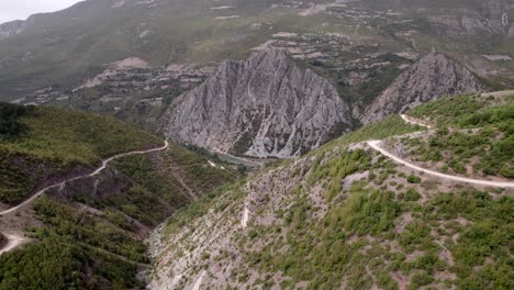 Drone-video,-frontal-plane-advancing-over-a-valley-in-Kukes-County,-Albania