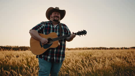 man singing country song in a field