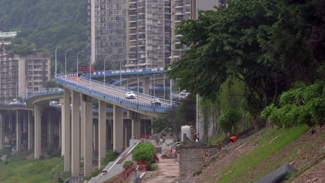 workers are building parks by the river in the city