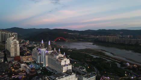 Hotel-Buildings-in-Popular-China-Tourist-City-of-Jinghong,-Xishuangbanna---Aerial