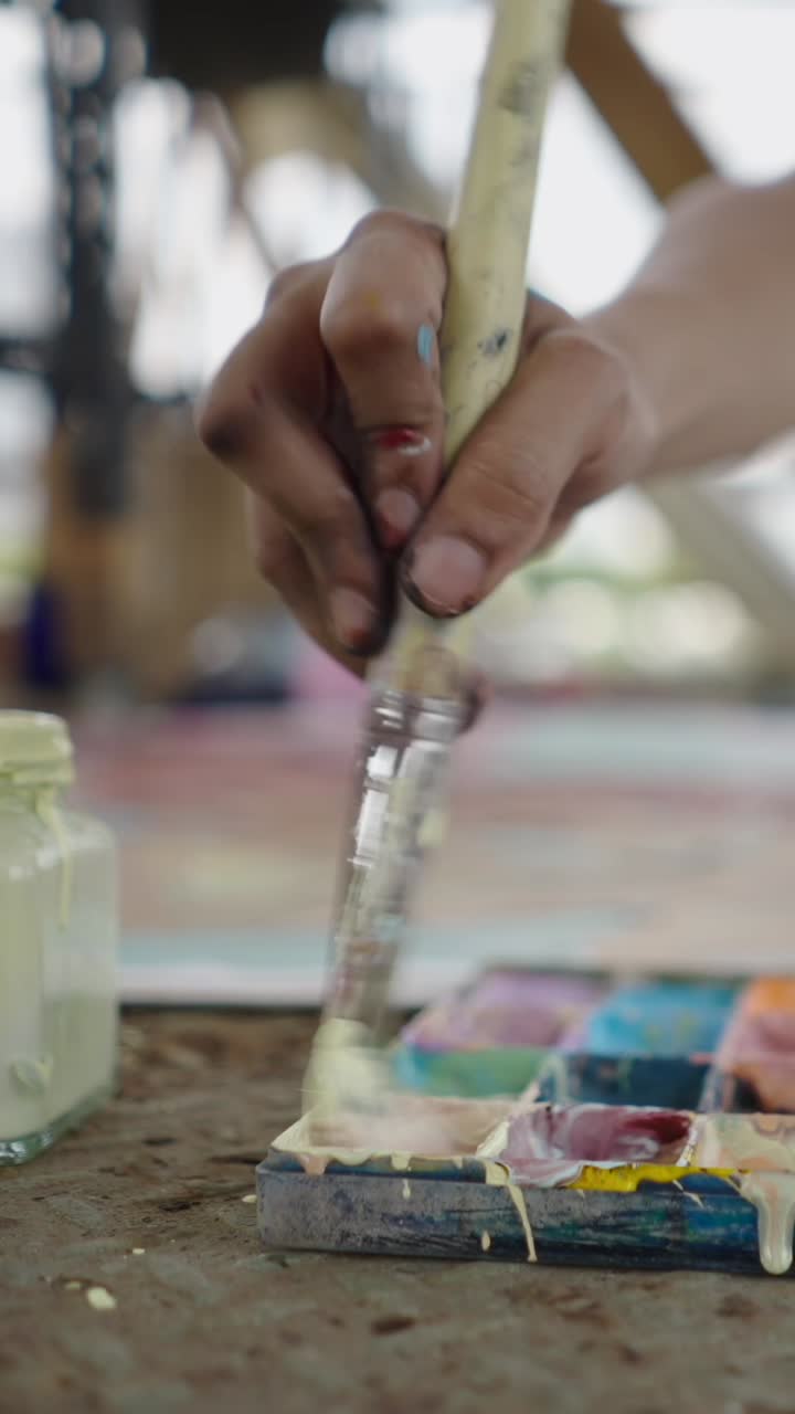 Artist painting artwork