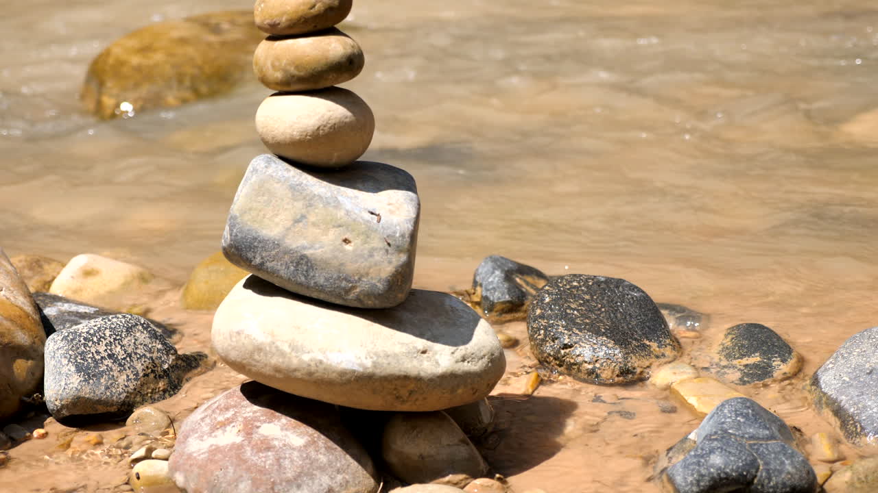 Cairn along a riverbank in Zion National Park, Utah