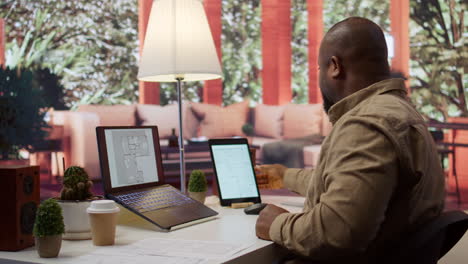 Businessman-searching-for-commercial-office-spaces-from-his-home-workstation