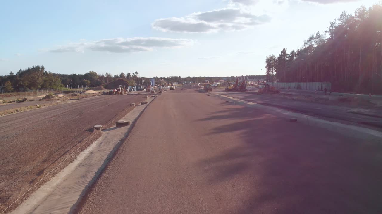 Aerial shot of a highway construction site with new concrete structures