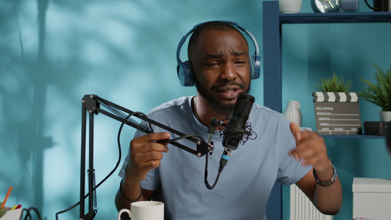 Blogger filming video with camera for podcast channel