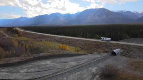 caravan driving on alaska highway, kluane national park, british columbia