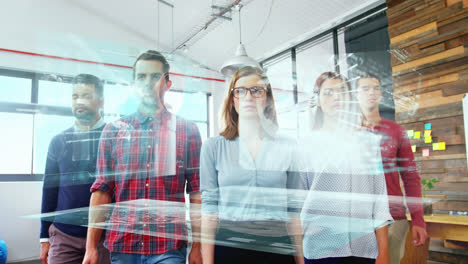 animation of data over diverse male and female business colleagues walking in office