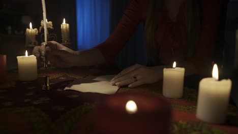 Woman Writing a Letter by Candlelight
